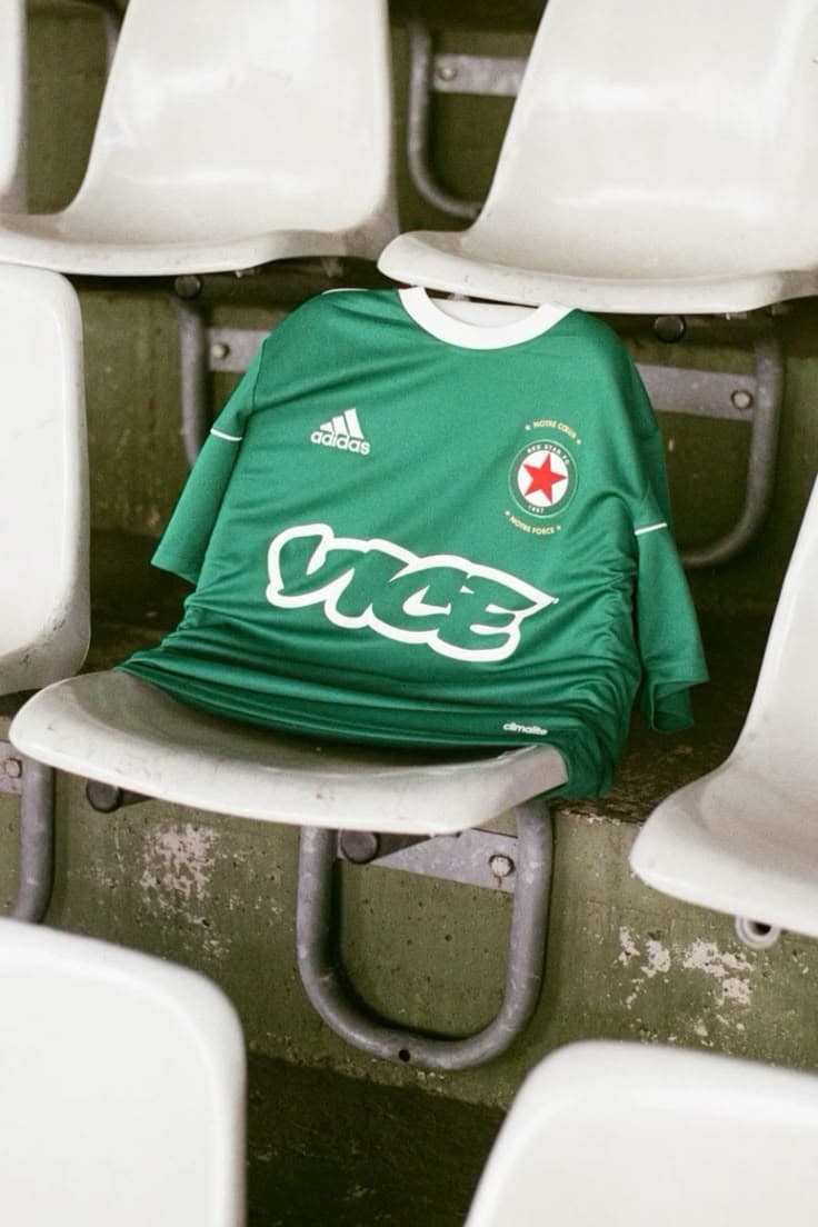 Green soccer jersey on stadium seat, lifestyle product context